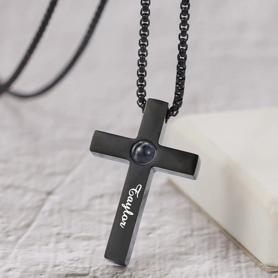 Custom cross projection necklace for men with personalized engraving and black link chain design.