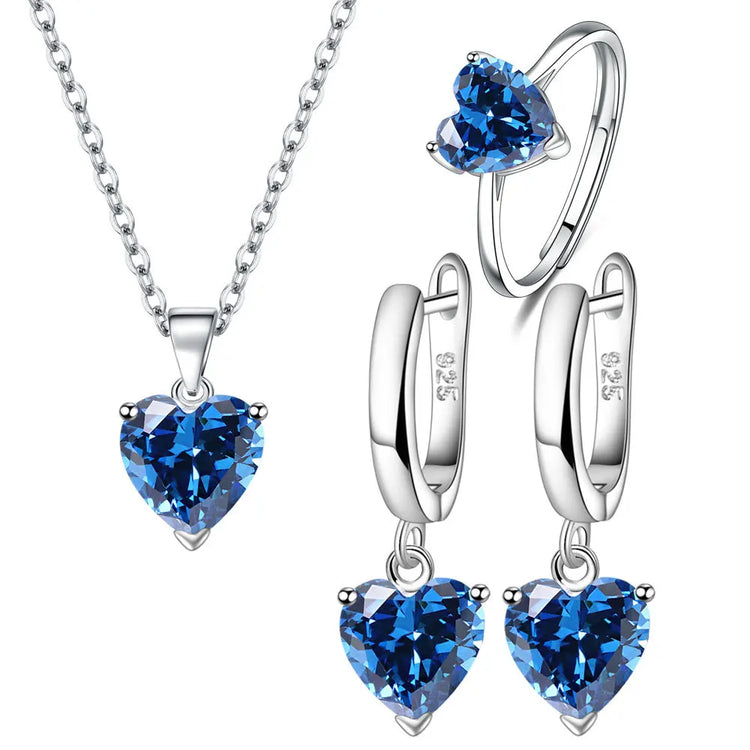 Alt Tag: heart zircon 925 silver bridal jewelry set with blue heart zircon necklace, ring and drop earrings in sterling silver