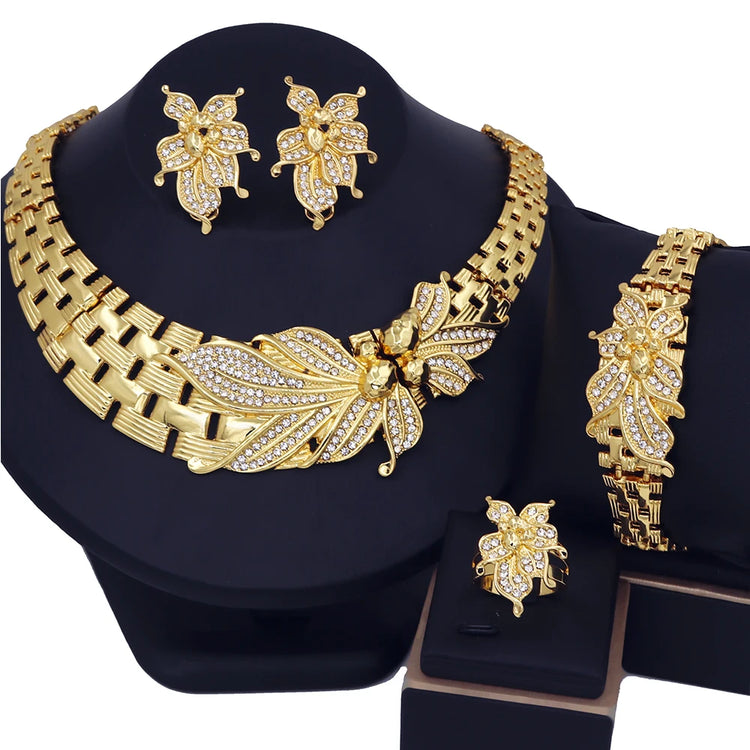 Alt Tag: 18K gold plated wedding jewelry set for women featuring butterfly necklace, earrings, bracelet and ring with crystal accents