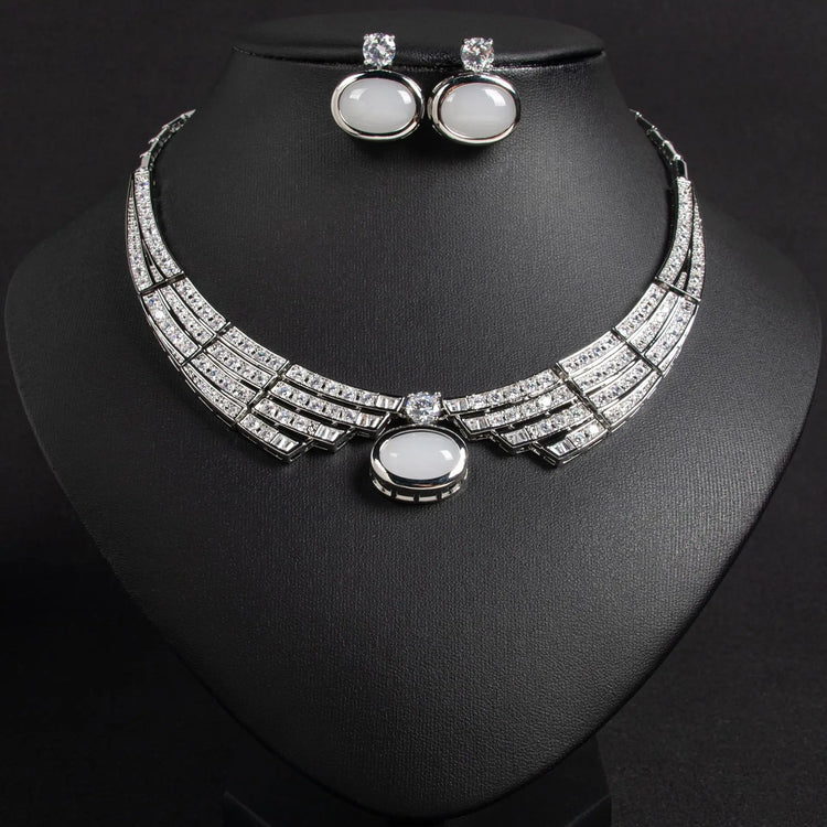 Alt Tag: bridal necklace and earrings set silver rhinestone collar necklace with oval white stones and matching stud earrings