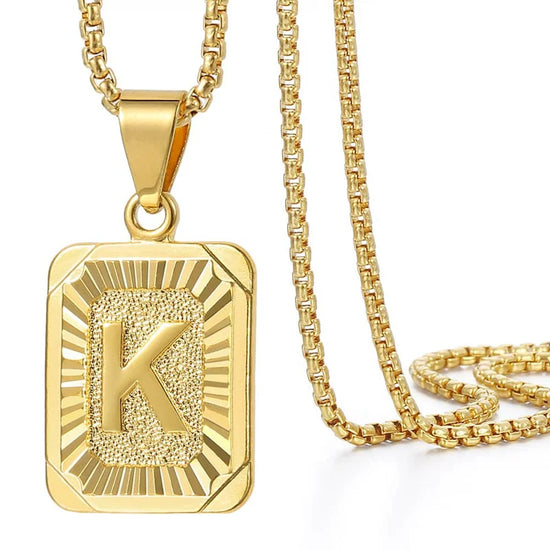 gold initial letter necklace with K pendant on a square charm link chain