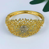 Alt Tag: 18K gold plated jewelry set for women gold bangle bracelet with crystal floral centerpiece, elegant fashion accessory