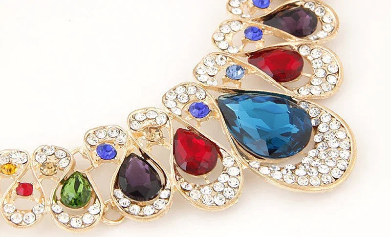 Alt Tag: luxury bridal crystal choker necklace close-up with multicolor teardrop crystals and rhinestone gold setting