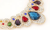 Alt Tag: luxury bridal crystal choker necklace close-up with multicolor teardrop crystals and rhinestone gold setting