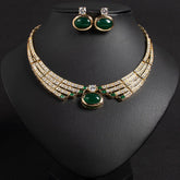 Alt Tag: bridal necklace and earrings set with green gemstone pendant, crystal choker necklace and matching stud earrings on display