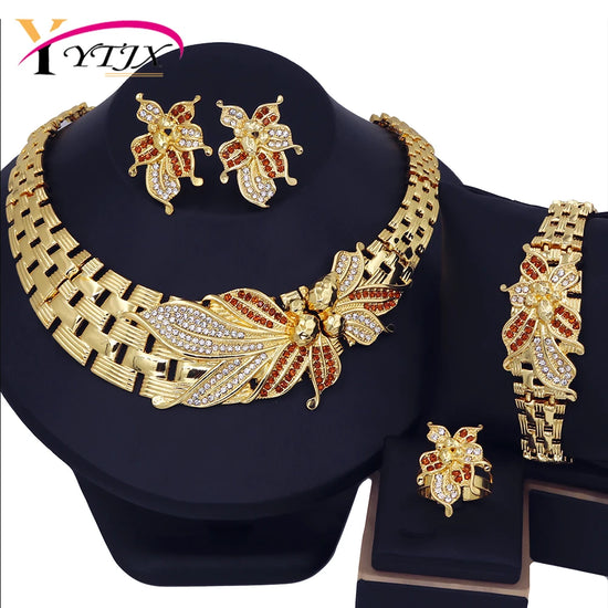Alt Tag: 18K gold plated wedding jewelry set for women with rhinestone butterfly necklace, earrings, bracelet and ring on display bust