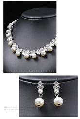 Alt Tag: pearl necklace and earrings set for women, white pearl statement necklace with matching drop earrings on black display