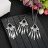Alt Tag: silver plated turquoise indian jewelry set necklace and dangle earrings with black stone charms on black display