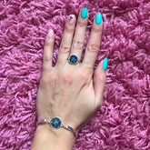 Alt Tag: silver plated rhinestone jewelry set for women bracelet and ring set on hand with blue druzy stones