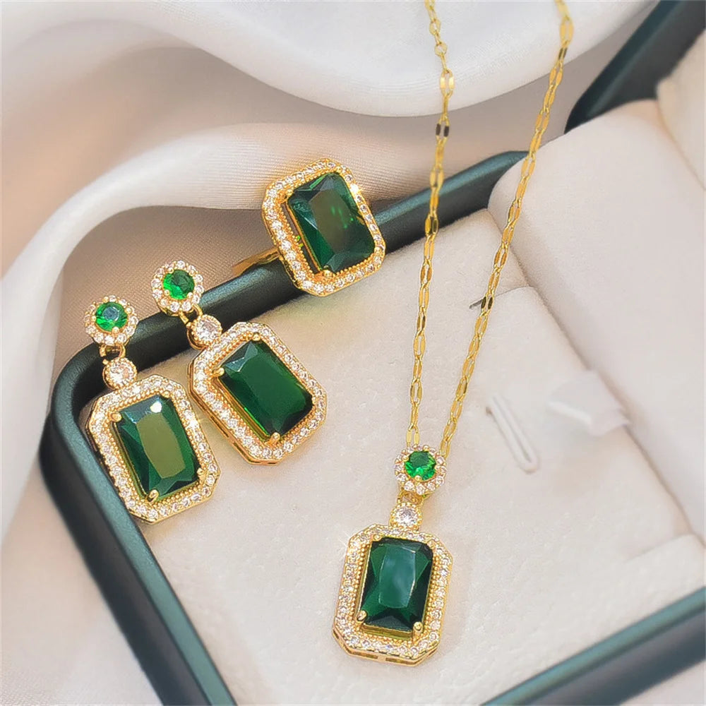 Alt Tag: emerald green zircon wedding jewelry set gold-tone necklace and drop earrings with rectangular green stones and crystal halo