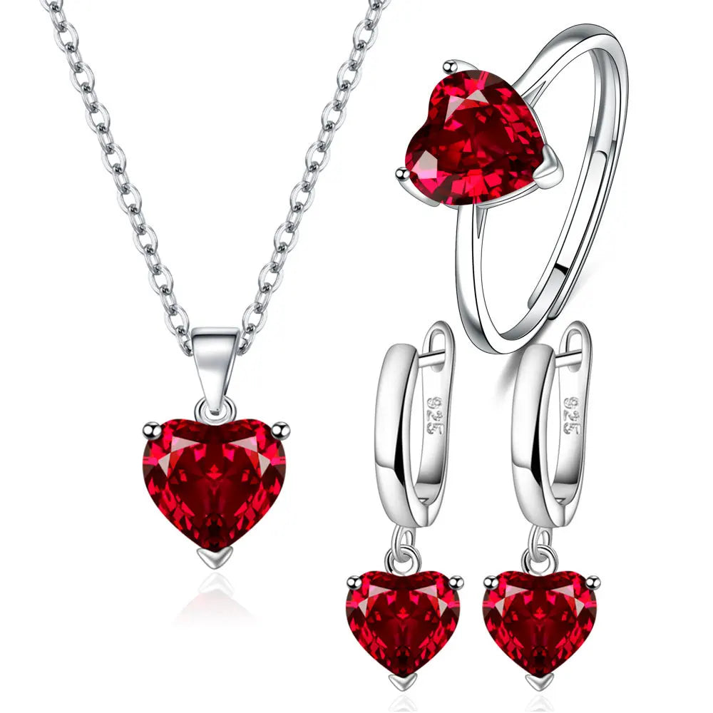 Alt Tag: heart zircon 925 silver bridal jewelry set with red heart zircon necklace, ring, and earrings for wedding bride