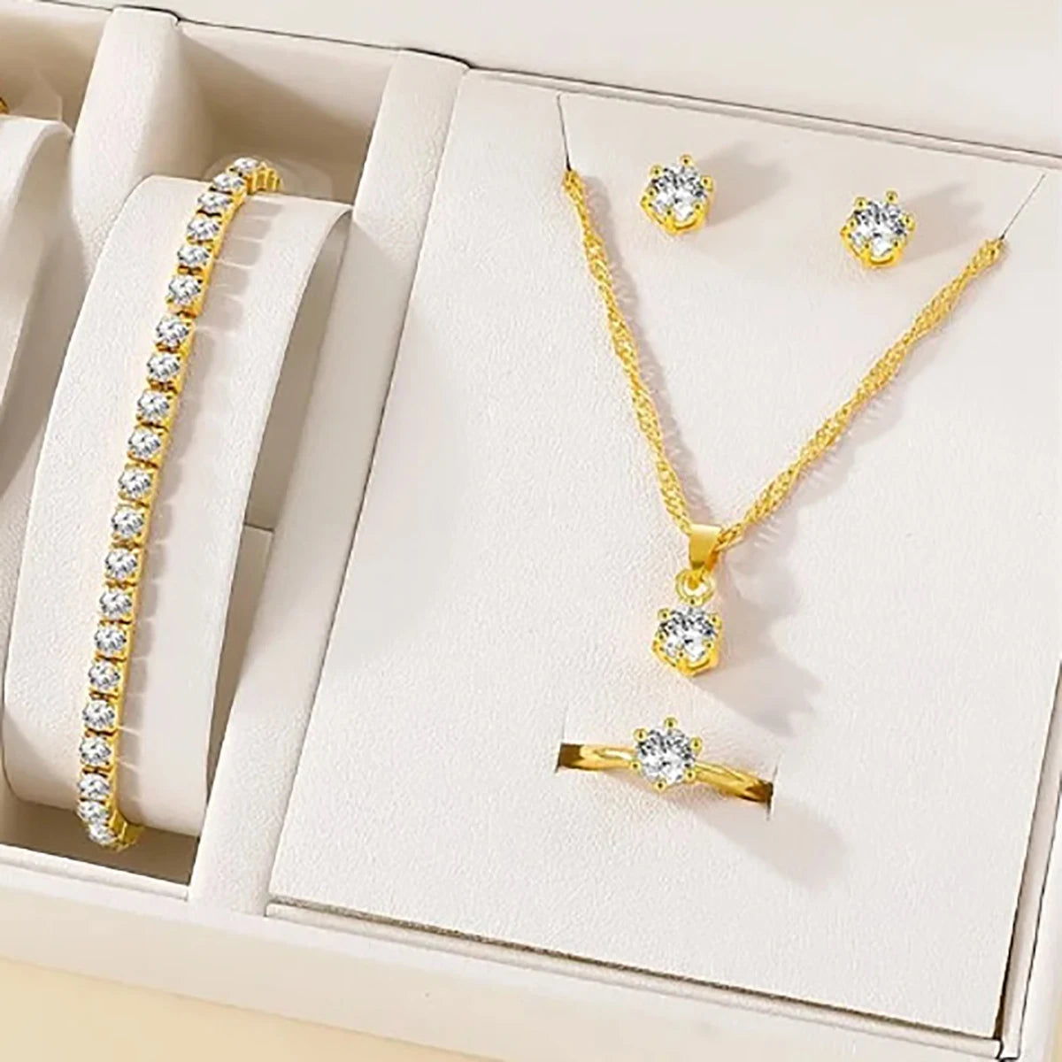 Alt Tag: 5 piece crystal jewelry set for women gold-tone necklace bracelet ring and stud earrings in gift box