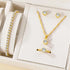 Alt Tag: 5 piece crystal jewelry set for women gold-tone necklace bracelet ring and stud earrings in gift box