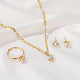 5 piece crystal jewelry set for women gold-tone necklace ring and crystal stud earrings on white background