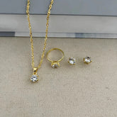 Alt Tag: 5 piece crystal jewelry set for women gold-tone necklace pendant ring and stud earrings with clear crystals