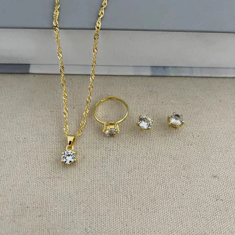 Alt Tag: 5 piece crystal jewelry set for women gold-tone necklace pendant ring and stud earrings with clear crystals