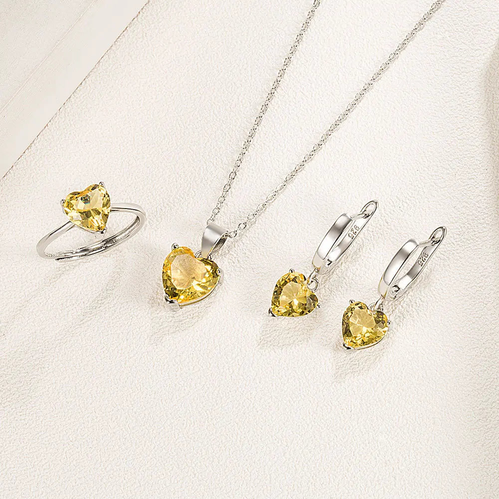 Alt Tag: heart zircon 925 silver bridal jewelry set with heart-cut yellow zircon necklace, ring and drop earrings