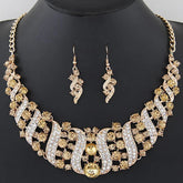 crystal bridal necklace and earrings set gold tone rhinestone wedding jewelry on black display bust