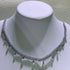 Alt Tag: pearl jewelry set wholesale for weddings crystal tennis necklace with dangling pearls on white display bust