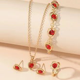 Alt Tag: heart crystal jewelry set for women gold-tone necklace bracelet ring and stud earrings with red heart crystals