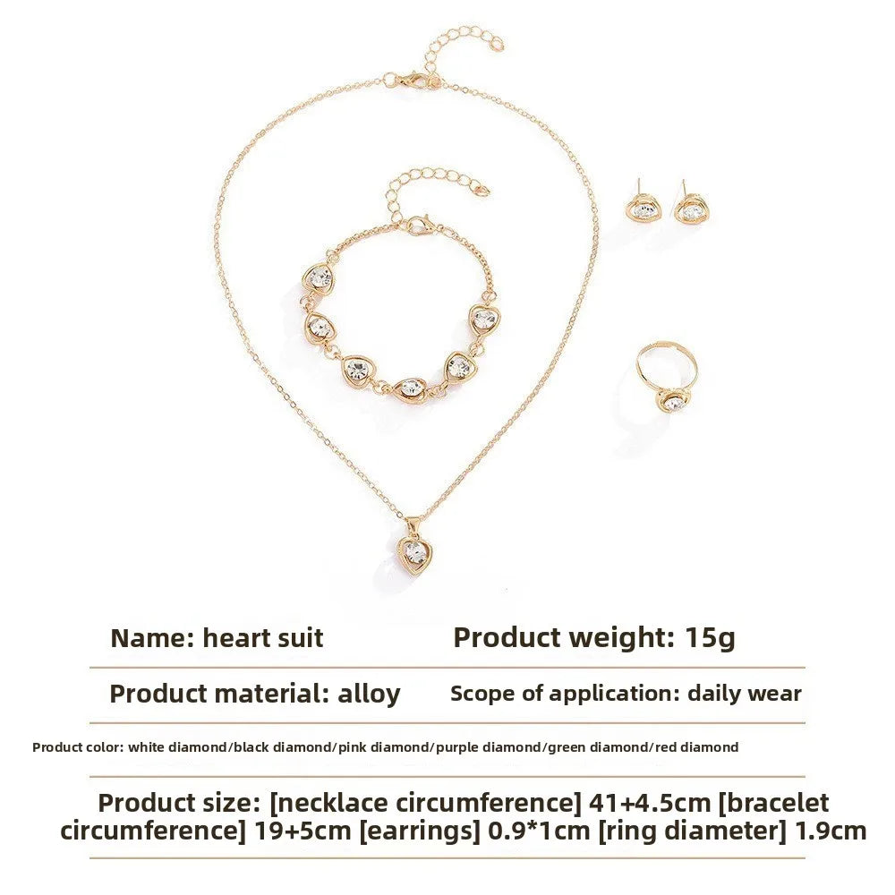 Alt Tag: heart crystal jewelry set for women gold-tone heart pendant necklace bracelet earrings and ring alloy daily wear set
