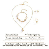 Alt Tag: heart crystal jewelry set for women gold-tone heart pendant necklace bracelet earrings and ring alloy daily wear set