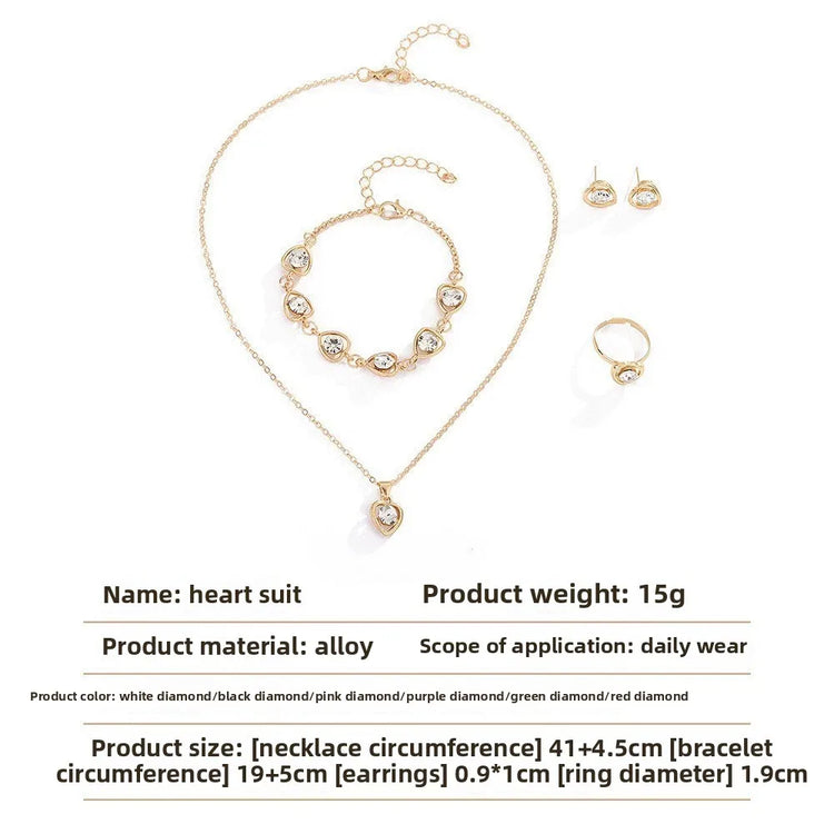 Alt Tag: heart crystal jewelry set for women gold-tone heart pendant necklace bracelet earrings and ring alloy daily wear set