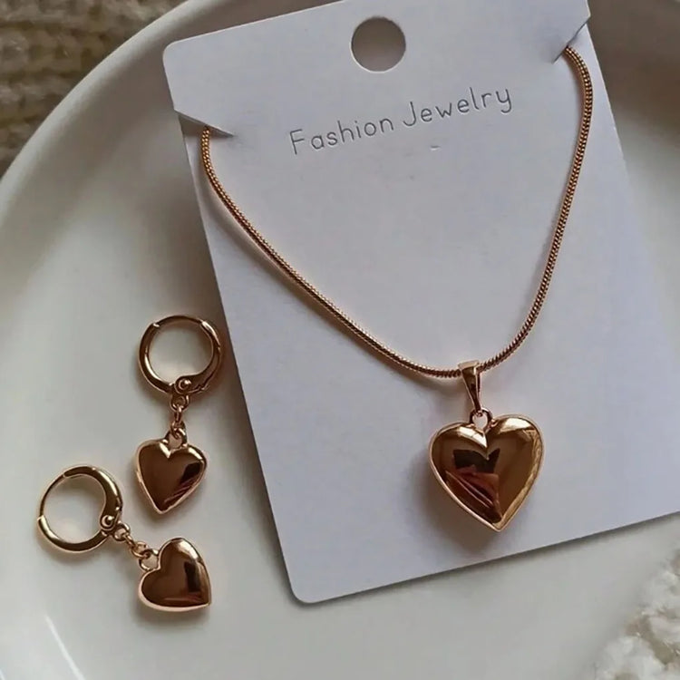 Alt Tag: gold plated heart dangle earrings necklace set with glossy heart pendant and matching dangle earrings on jewelry card