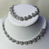 pearl jewelry set wholesale for weddings silver heart rhinestone necklace and bracelet set on display
