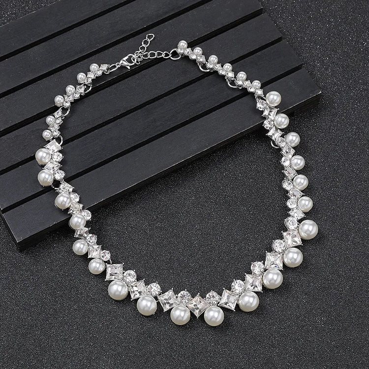 Alt Tag: pearl necklace and earrings set for women with faux pearls and crystal rhinestones, adjustable silver-tone chain clasp