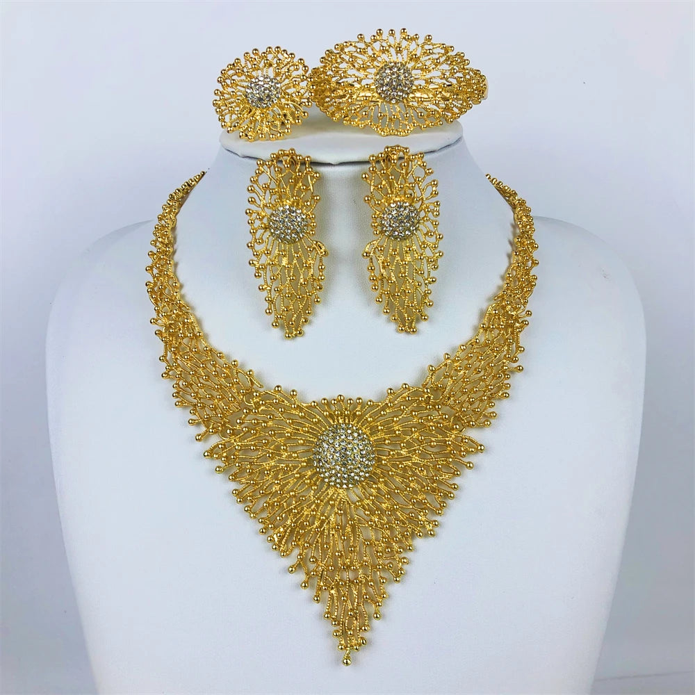 Alt Tag: 18K gold plated jewelry set for women gold necklace and matching earrings with crystal floral design on display bust