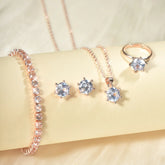 Alt Tag: 5 piece crystal jewelry set for women rose gold bracelet stud earrings necklace pendant and ring with clear crystals