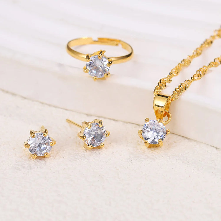 Alt Tag: 5 piece crystal jewelry set for women with gold-tone ring, pendant necklace and crystal stud earrings