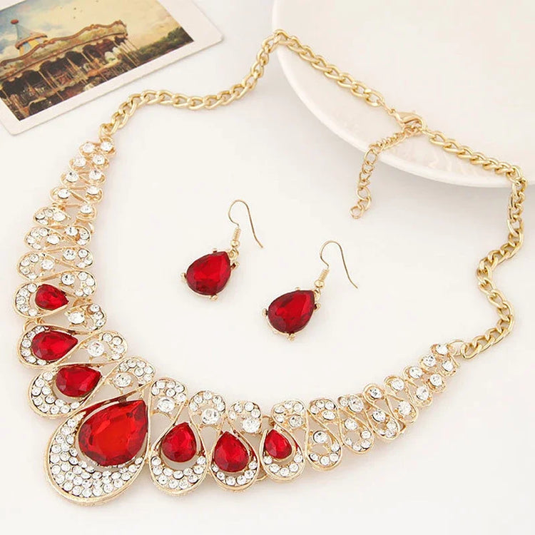 Alt Tag: luxury bridal crystal choker necklace with red teardrop crystals and rhinestones, gold chain, matching red crystal drop earrings