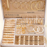 Alt Tag: 54 piece fashion jewelry set gold-tone rings hoop earrings bracelets and pearl pieces in organizer box
