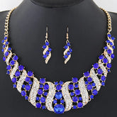Alt Tag: crystal bridal necklace and earrings set with blue and clear rhinestones, gold-tone statement wedding jewelry set