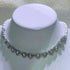 pearl jewelry set wholesale for weddings necklace with heart-shaped crystal pendant and pearl strands on display bust