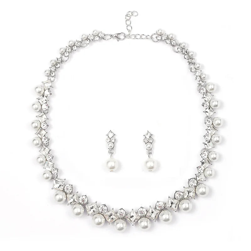 Alt Tag: pearl necklace and earrings set for women with rhinestone crystal accents and faux pearls, bridal jewelry set on white background