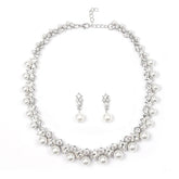 Alt Tag: pearl necklace and earrings set for women with rhinestone crystal accents and faux pearls, bridal jewelry set on white background