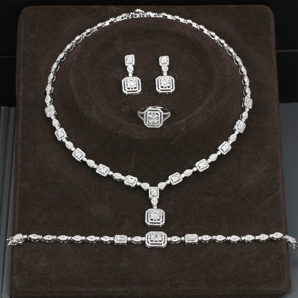 Alt Tag: rhinestone crystal bridal jewelry set with necklace, drop earrings, ring and bracelet in silver tone for wedding