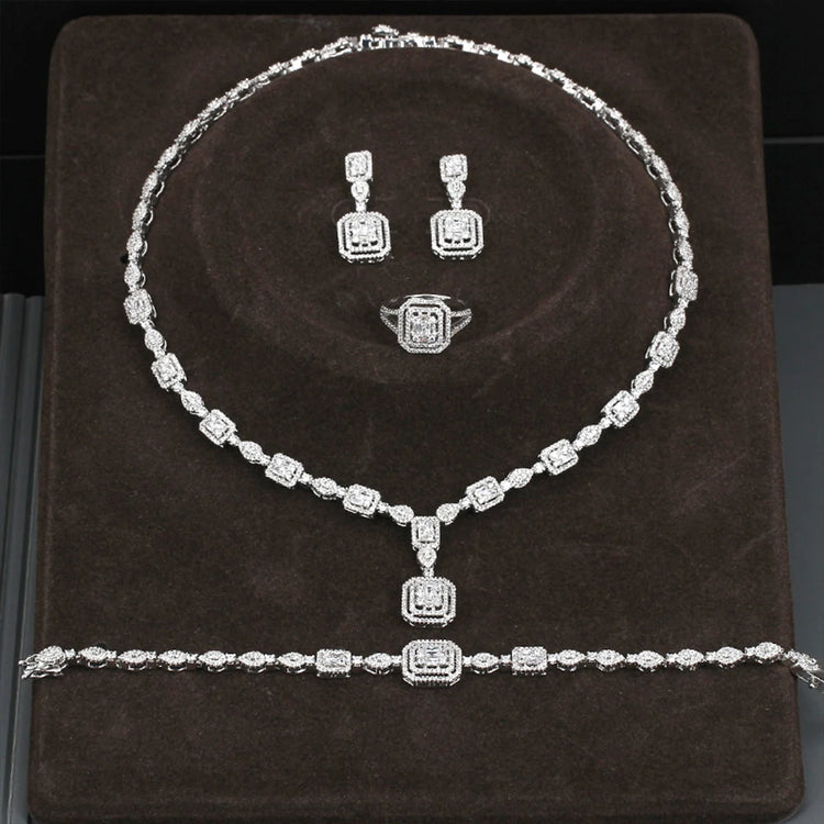 Alt Tag: rhinestone crystal bridal jewelry set with necklace, drop earrings, ring and bracelet in silver tone for wedding
