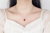 Alt Tag: heart zircon 925 silver bridal jewelry set necklace with red heart pendant on bride in white dress
