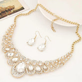 Alt Tag: luxury bridal crystal choker necklace set with gold twisted chain, teardrop rhinestone pendant and matching crystal drop earrings