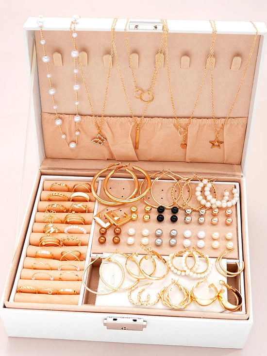 Alt Tag: elegant pearl jewelry set for women displayed in organizer box with pearl earrings, gold necklaces, bracelets and rings