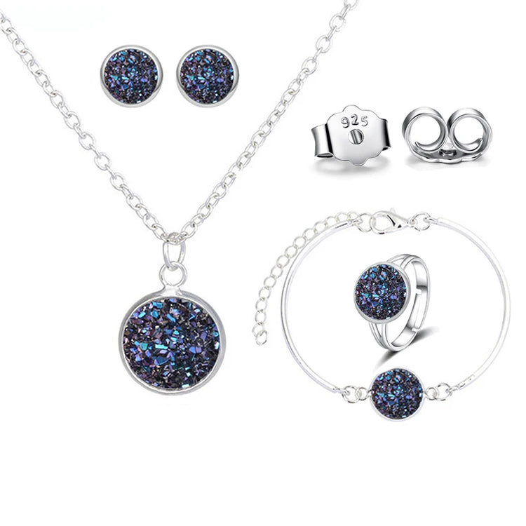 Alt Tag: silver plated rhinestone jewelry set for women necklace pendant, stud earrings, ring and bracelet in silver tone with blue druzy stones