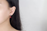 Alt Tag: heart zircon 925 silver bridal jewelry set red heart zircon drop earrings on model ear, sterling silver wedding jewelry