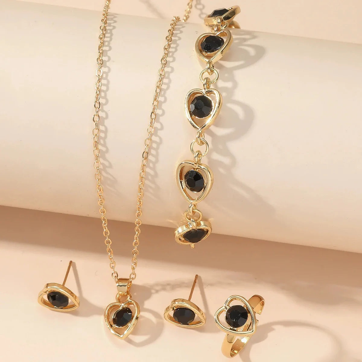 heart crystal jewelry set for women gold heart necklace, bracelet, earrings and ring with black crystal stones